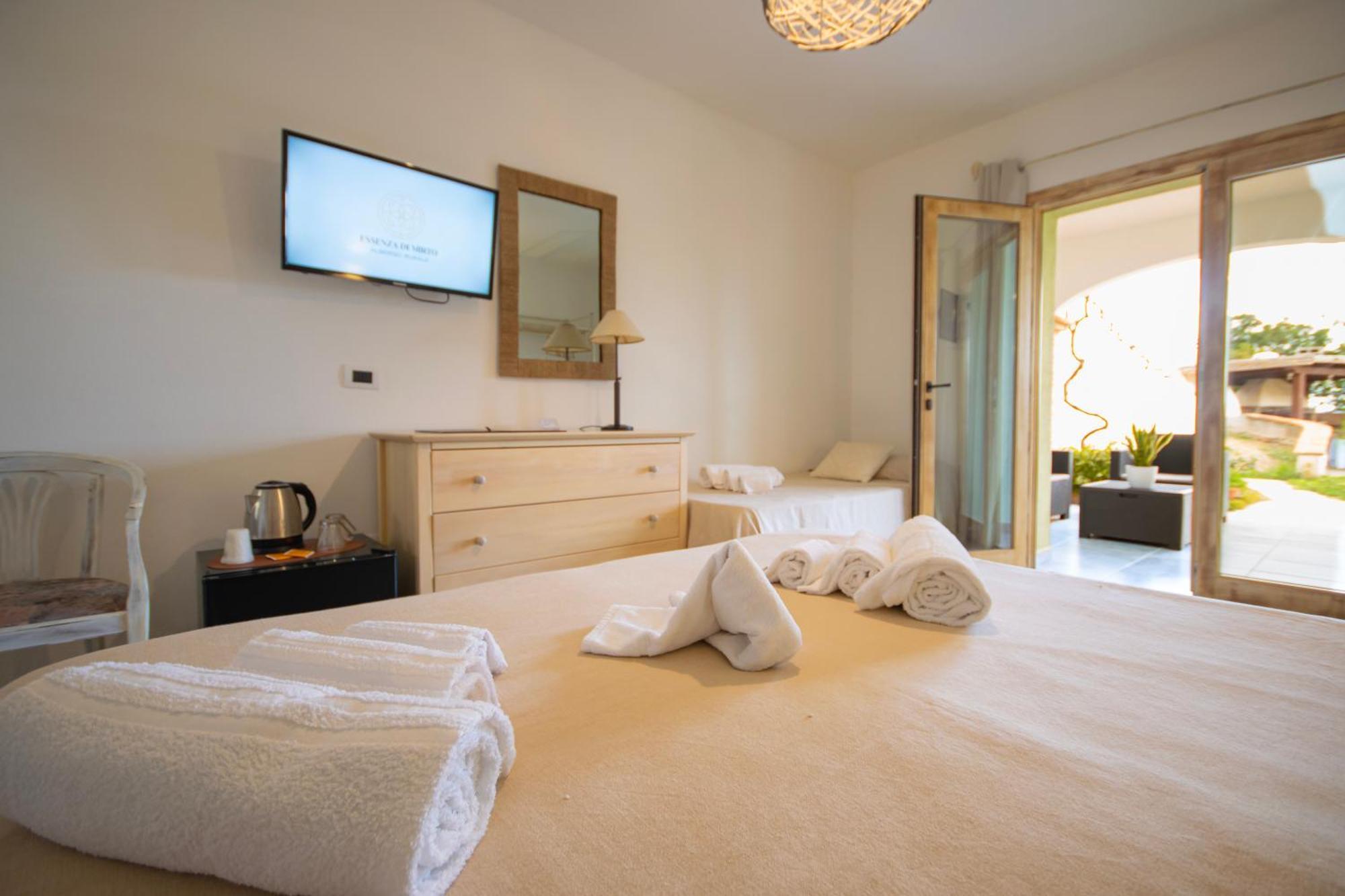 Hotel Essenza Di Mirto La Caletta Pokoj fotografie