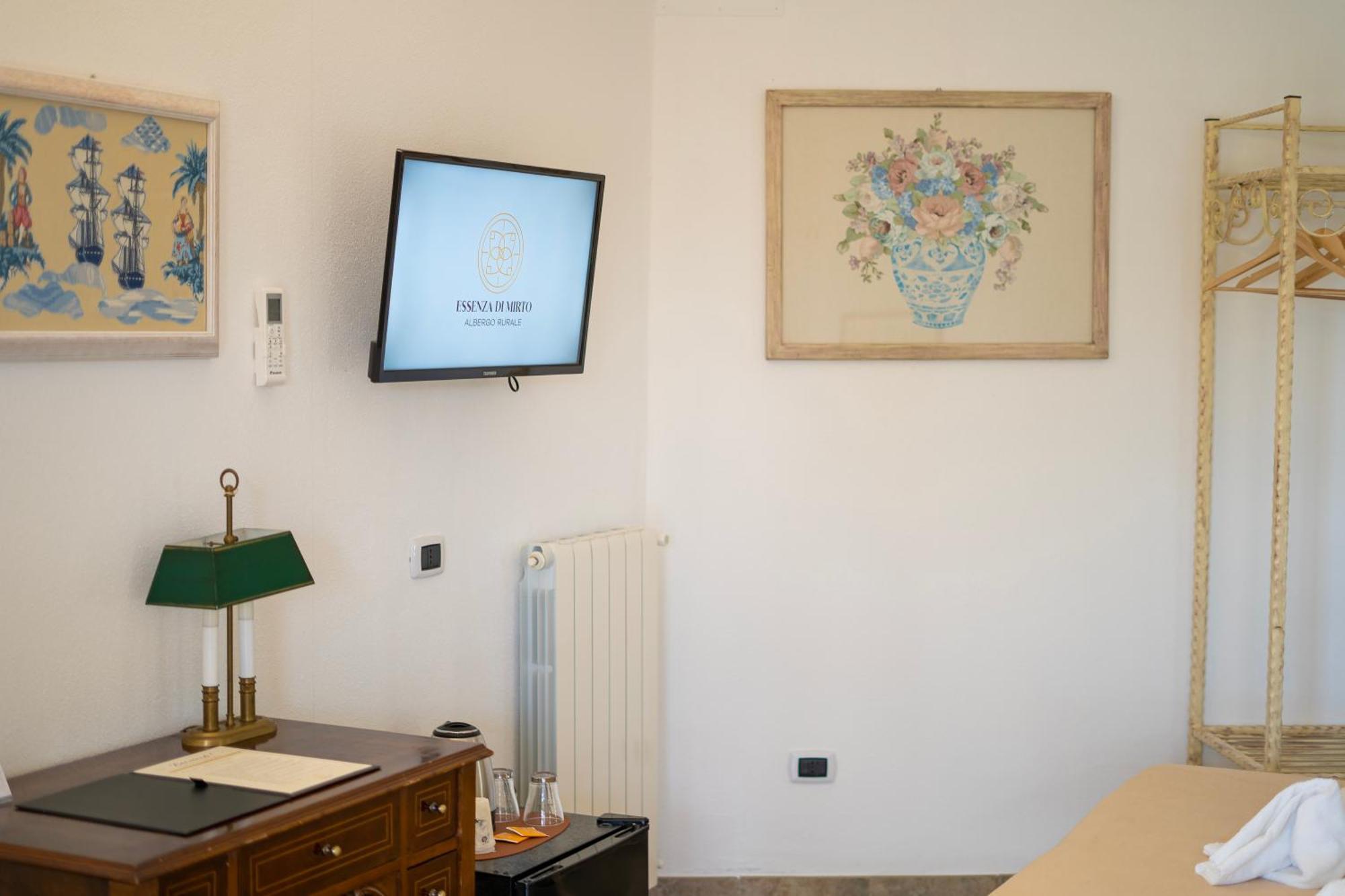 Hotel Essenza Di Mirto La Caletta Pokoj fotografie